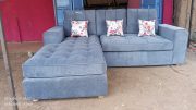 4 Seater L-Shaped Grey Seat with Footrest & Studded Detailing